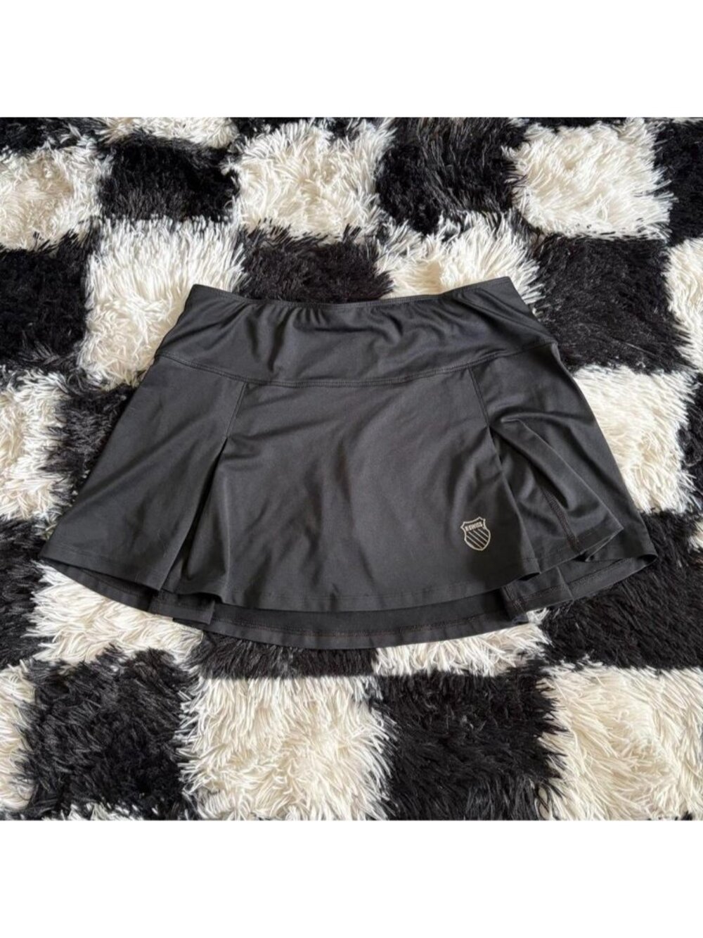 K-Swiss black tennis skirt with built-in shorts and pockets